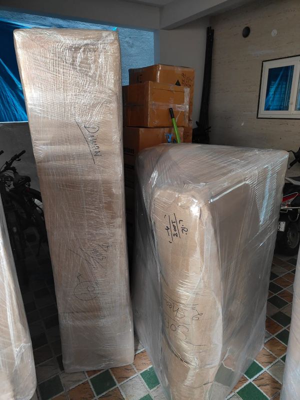 Furniture wrapped and moved out of a house